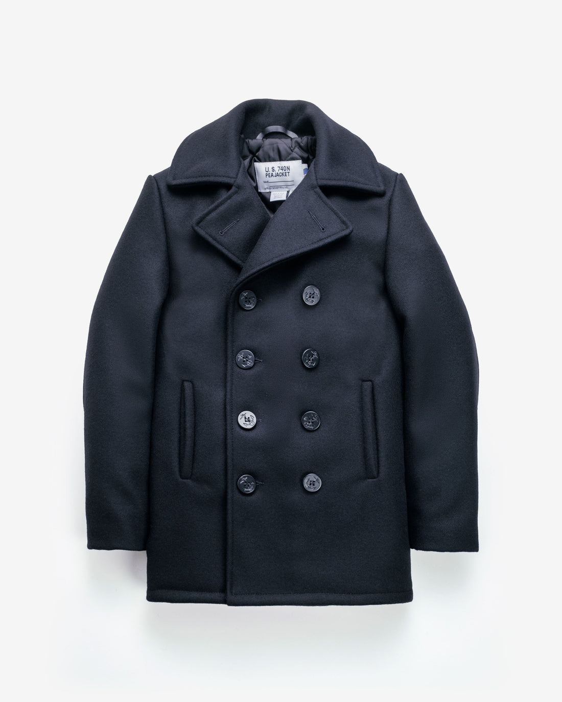 Navy peacoat with wide lapels, two rows of dark buttons and a short straight hem